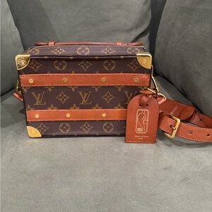 Louis Vuitton x NBA Monogram Collaboration handle Soft Trunk.